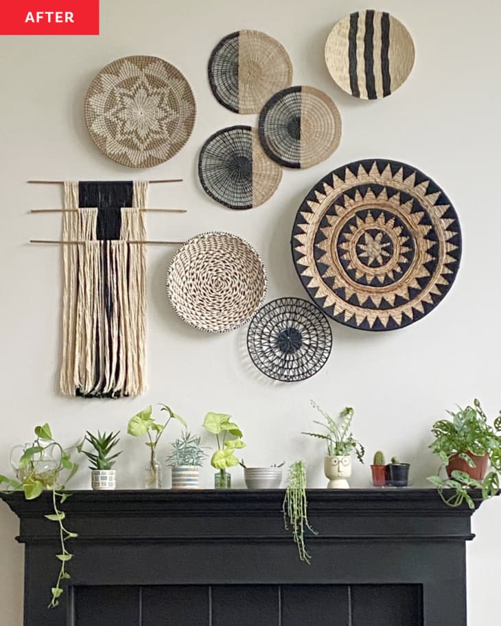 Wall above fireplace decorated with graphic baskets.