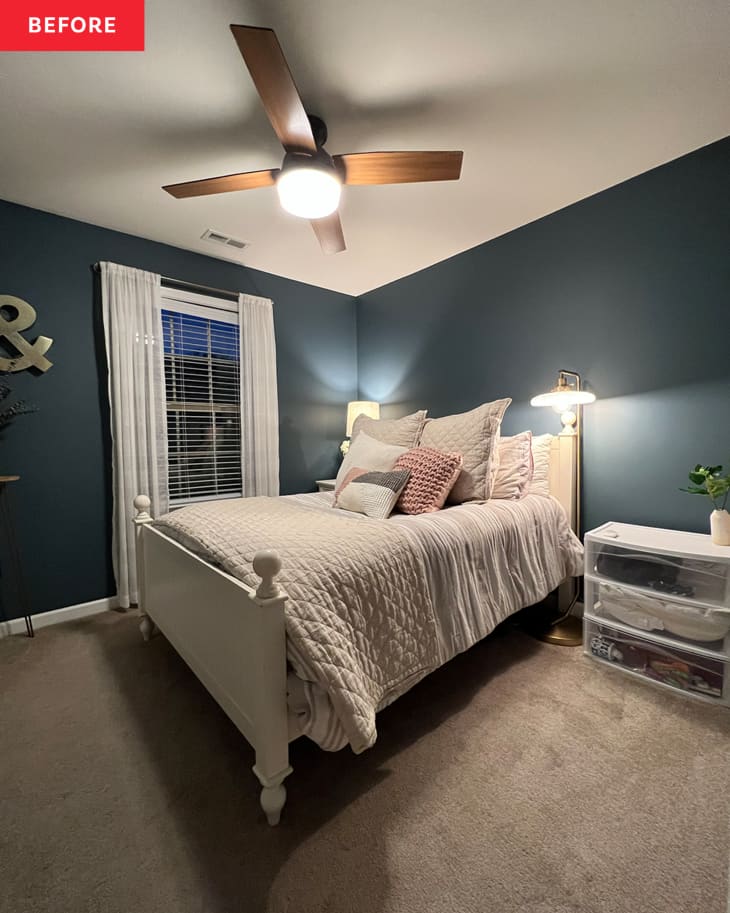 Bedroom with blue painted walls before renovation.