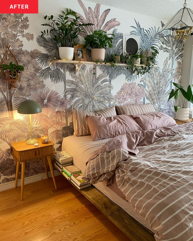 Bedroom with floral wallpaper after renovation.