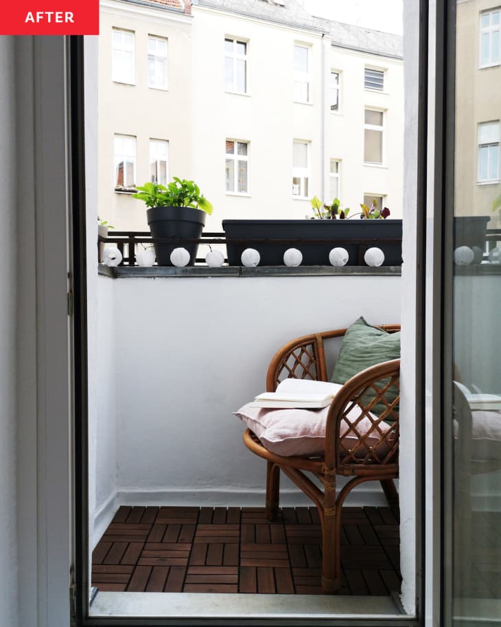 Balcony with wicker chair after renovation.