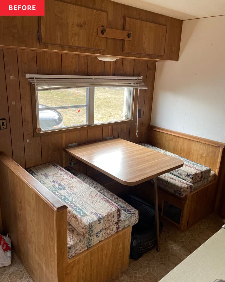 Small dining area in camper before renovation.