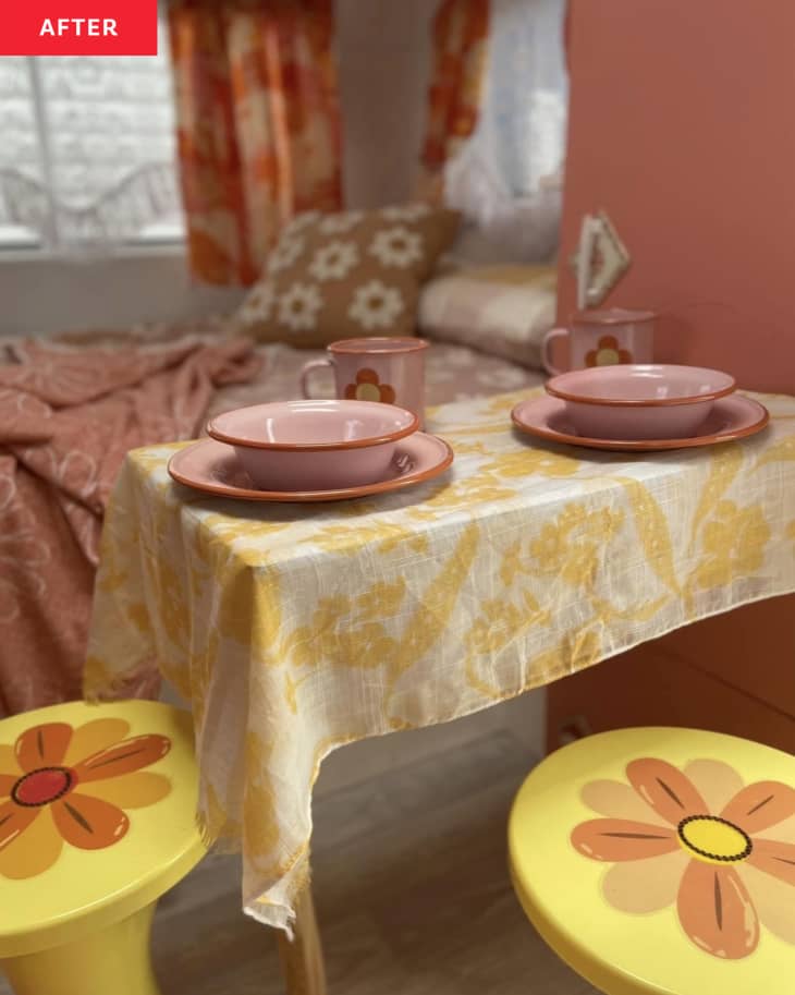 After: Caravan interior with pink and yellow retro decor