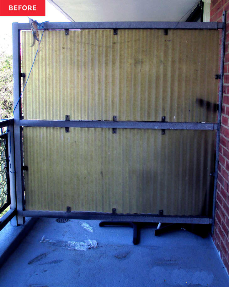 plain corrugated metal "wall" or partition on balcony before renovation/makeover