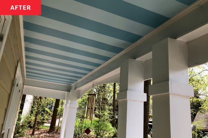 Monotone blue strip painted ceiling on newly renovated front porch.