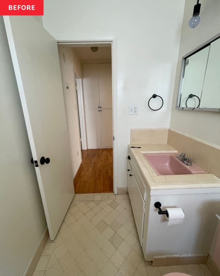 Bathroom with door open before renovating.