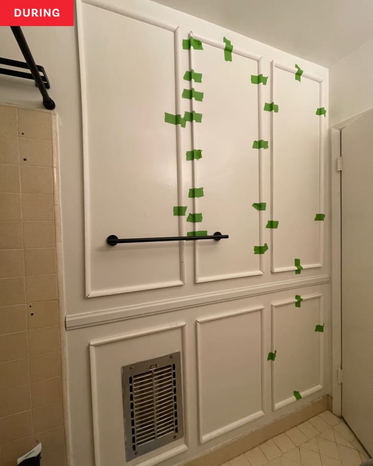 Panels added to bathroom wall during renovation