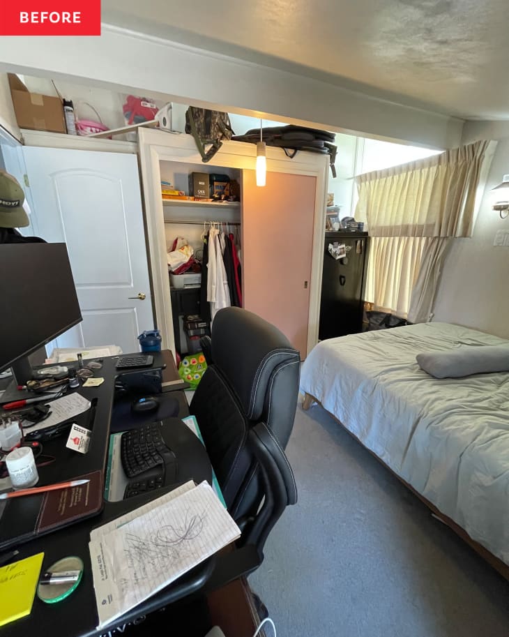 Bedroom before renovation/makeover into nursery. White walls, gray carpet, TV, bed, somewhat messy and disorganized