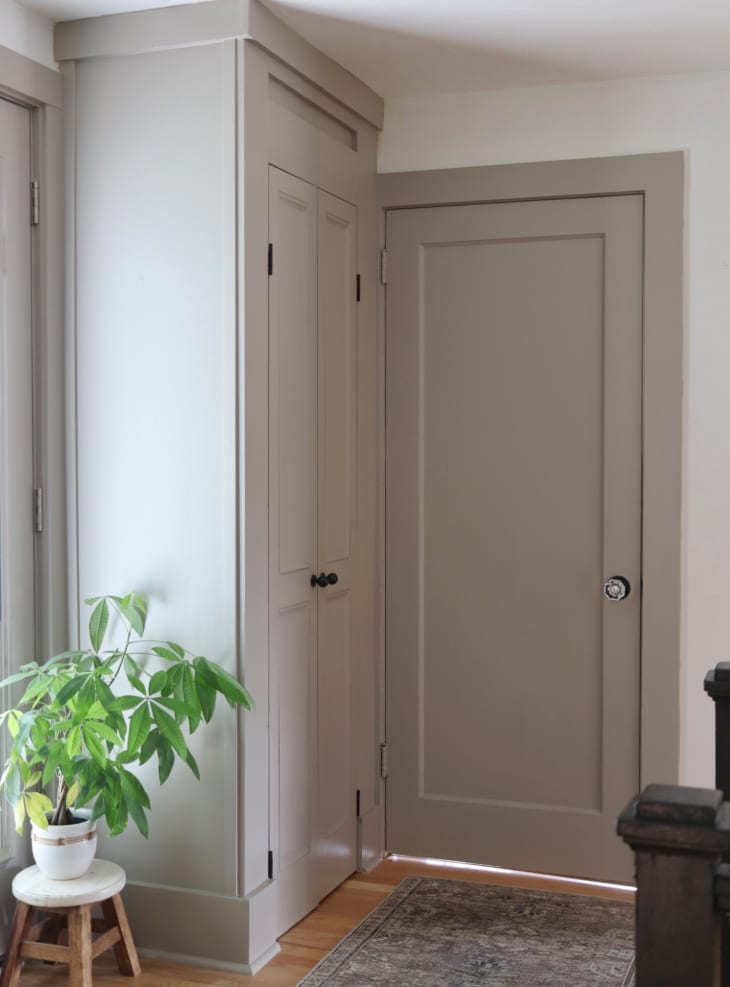 Traditional-style paneled closet doors viewed from side