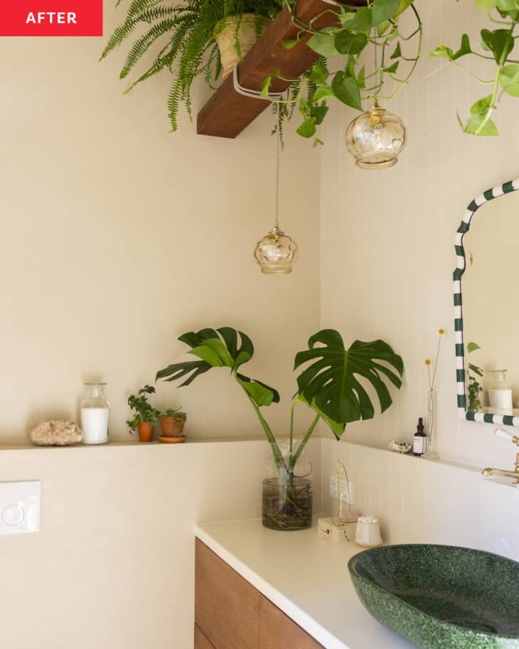 Bathroom countertop with a green stone sink base.