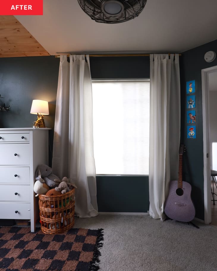 Dark green painted kids bedroom after renovation.