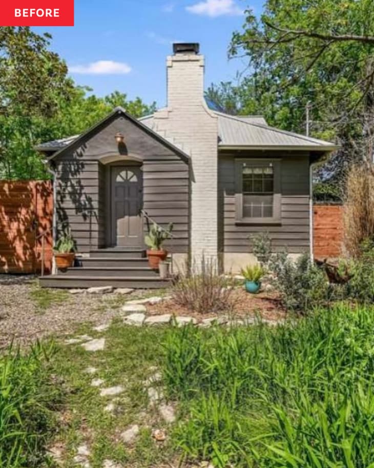 A black house with a white chimney