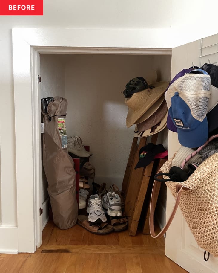 Before: Cluttered closet with textured white walls