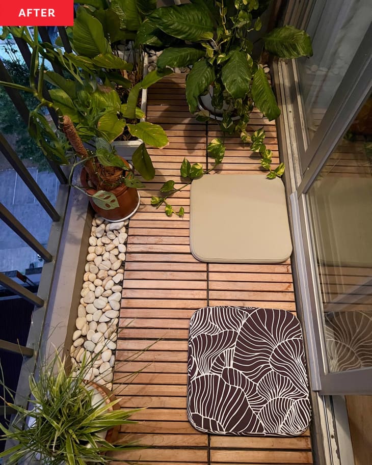 Flooring in plant filled city balcony after renovation.