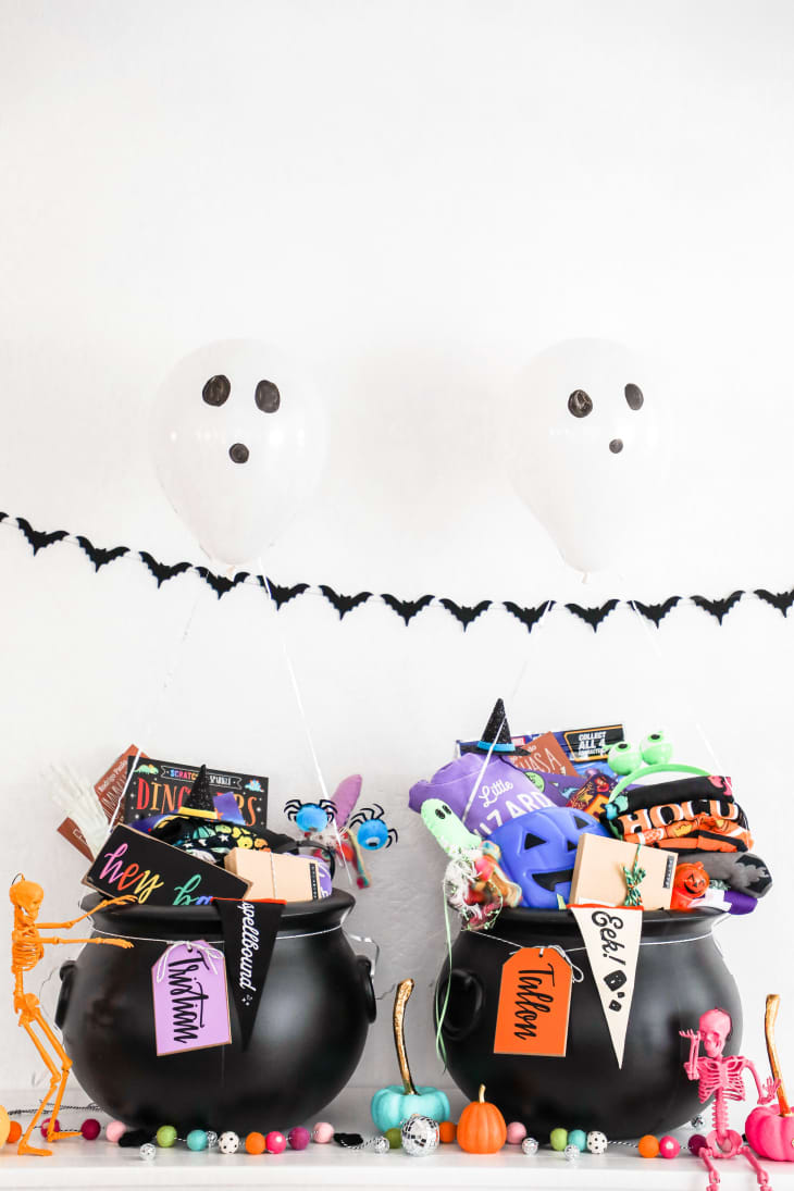 Plastic cauldrons filled with Halloween-themed toys