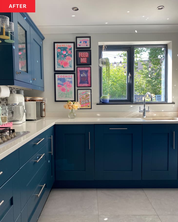 Kitchen cabinets painted blue after renovation.