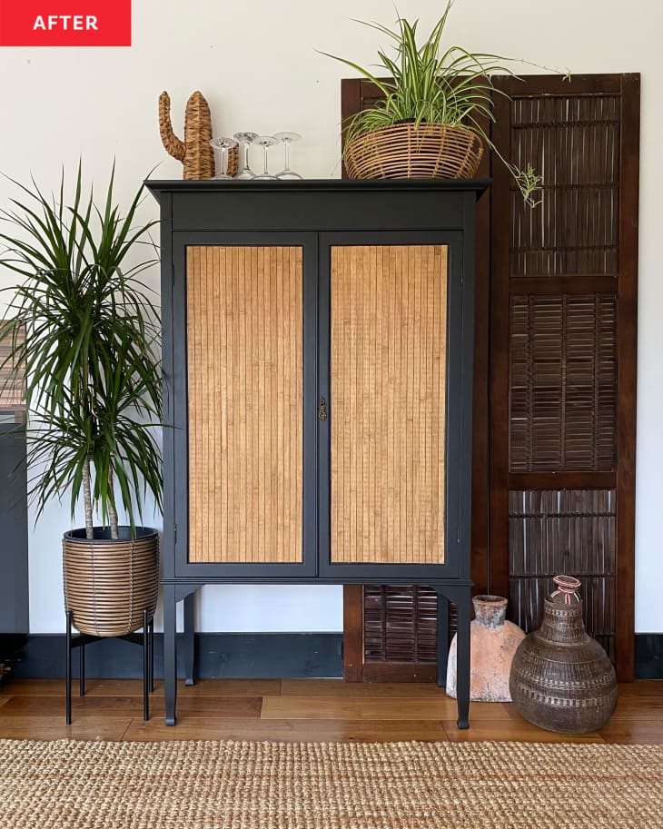 A black and brown cabinet in a living room
