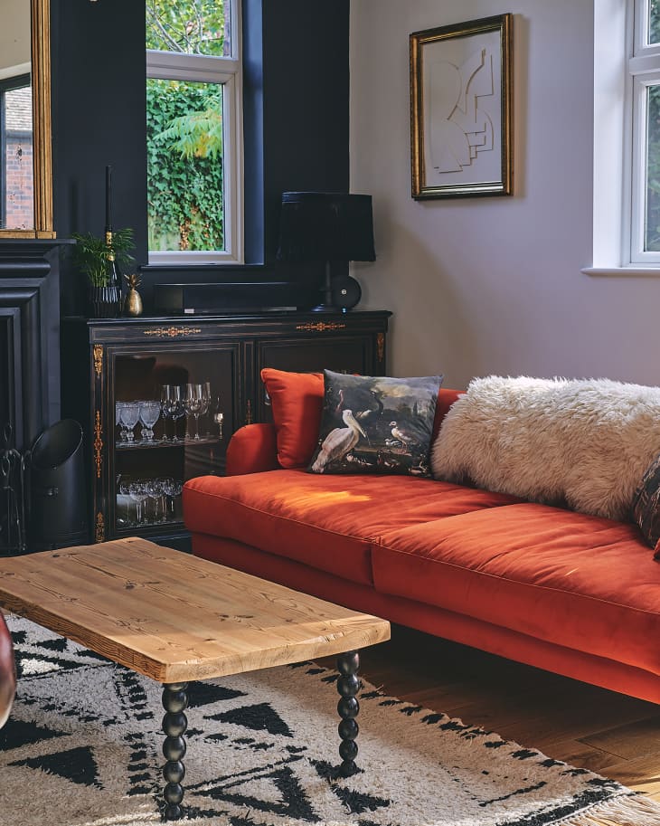 Orange sofa in newly renovated living room.