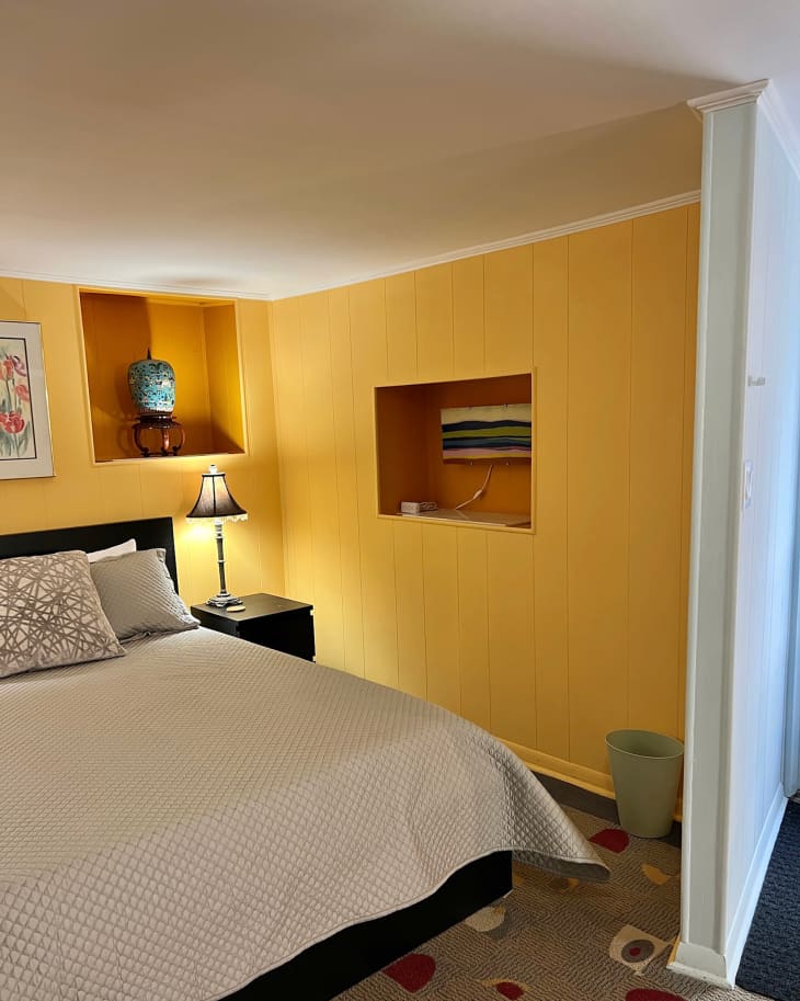 Yellow painted bedroom before remodel.