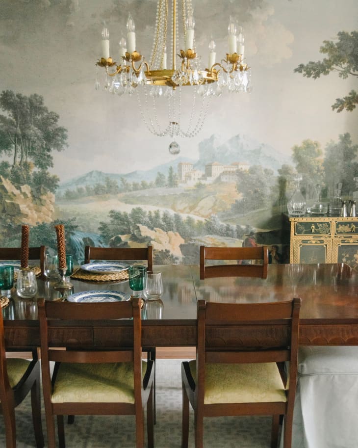 Scenic wallpaper in newly renovated dining room.