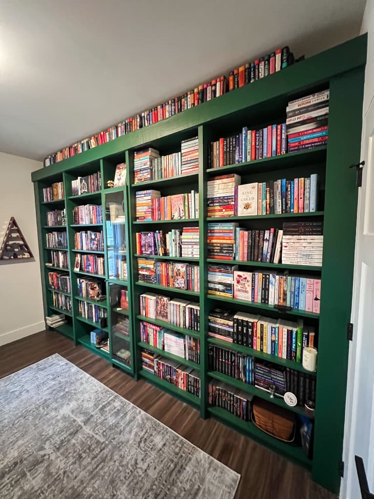 Book filled green painted Ikea Billy bookcase