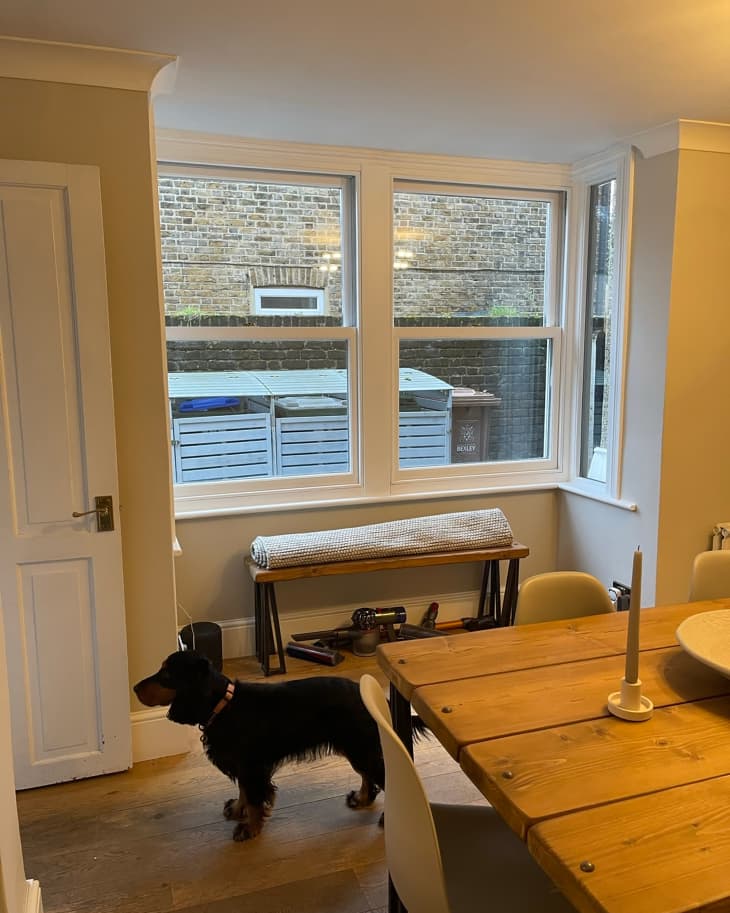 A bench in front of the window before installing the window seat.