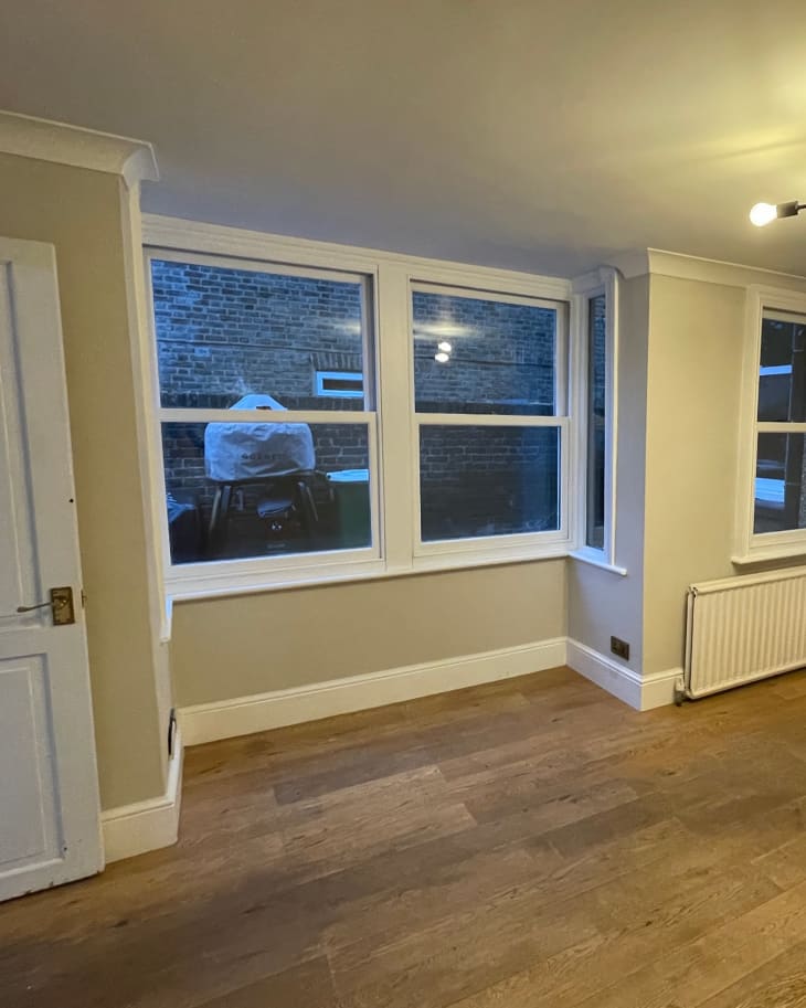 The window in the kitchen before installing the window seat.