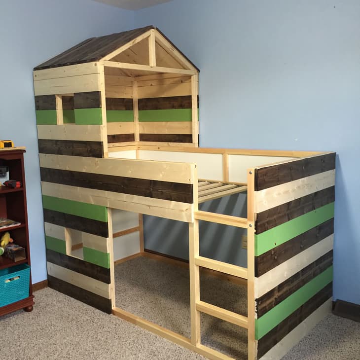 Multi colored wooden slats on the side of kids bunk bed.