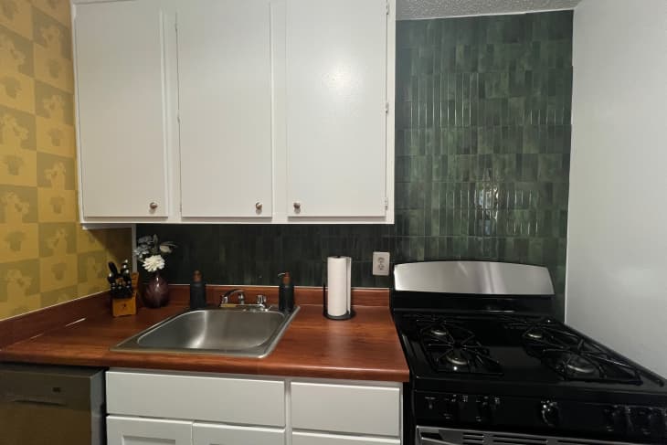 Peel and stick the green tile backsplash.