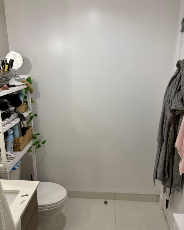 Blank wall in bathroom before painting.