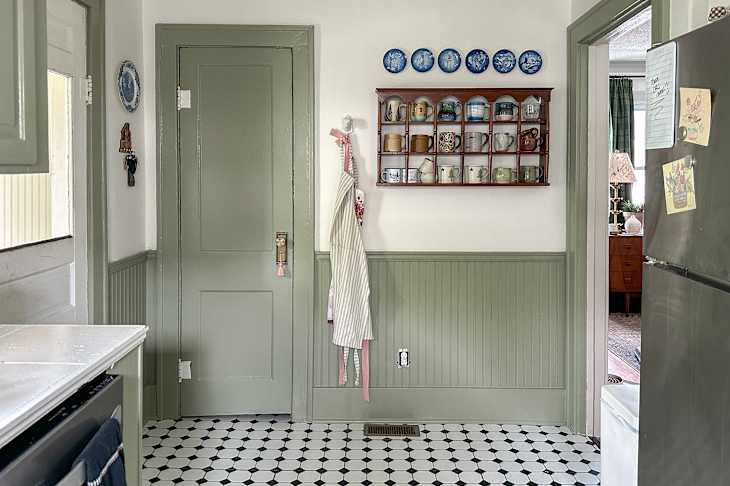 Green wainscoting in kitchen after painting.