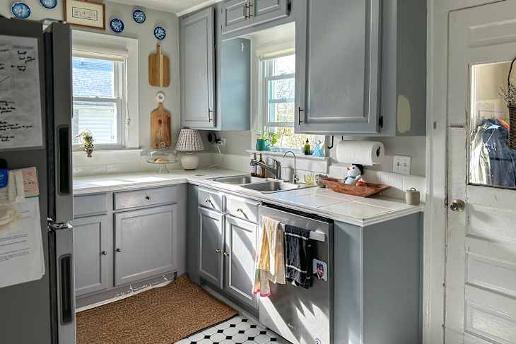 Blue painted kitchen cabinets.