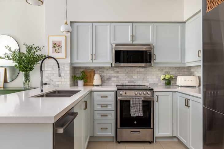 How a Blue Paint Makeover Turned a Dated Kitchen Into Modern Chic
