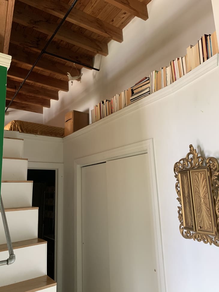 Stairsteps and books on ledge