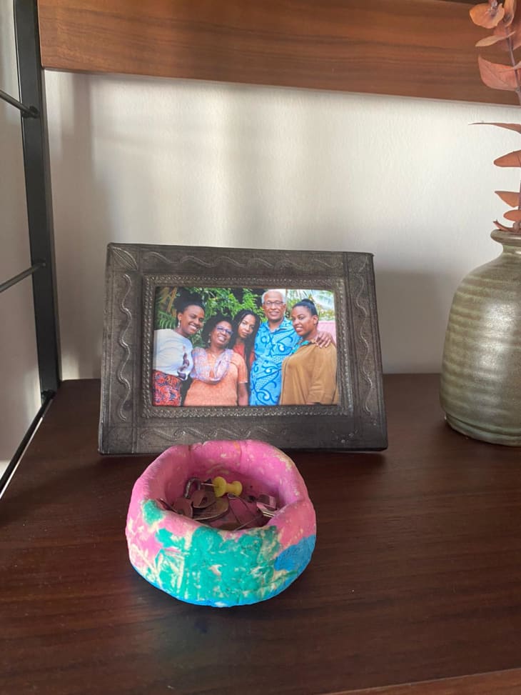 Picture frame with colorful pottery catchall