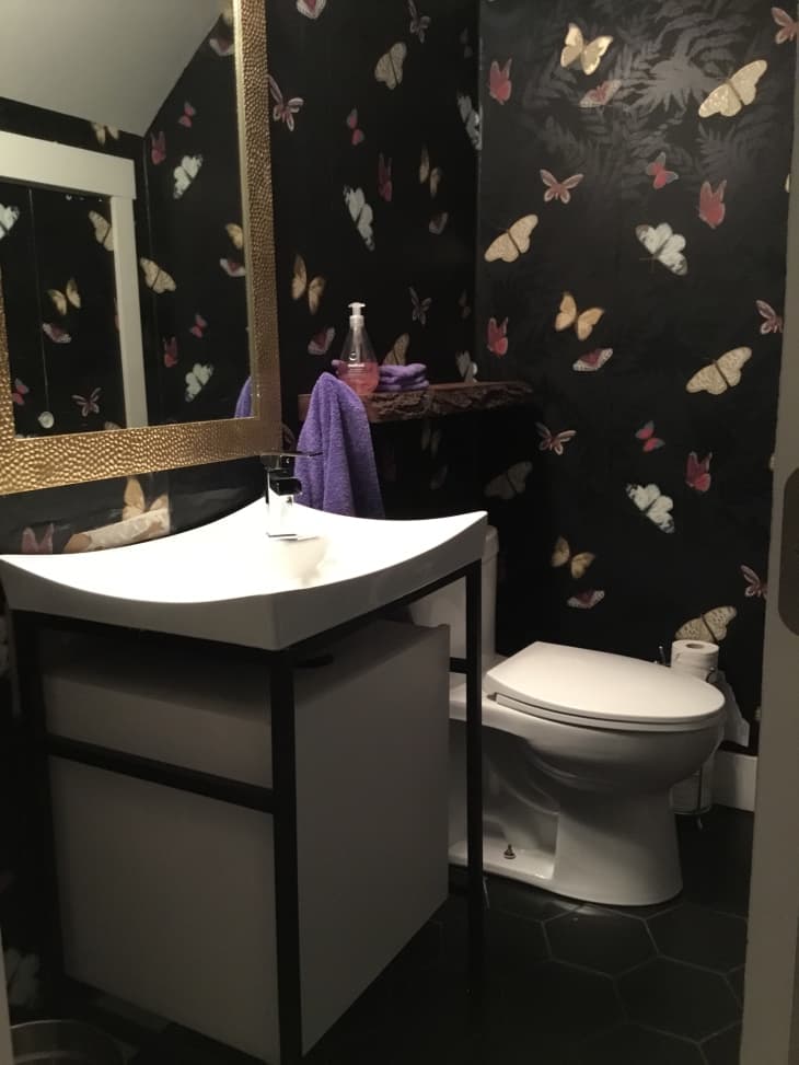 Bathroom with butterfly wallpaper