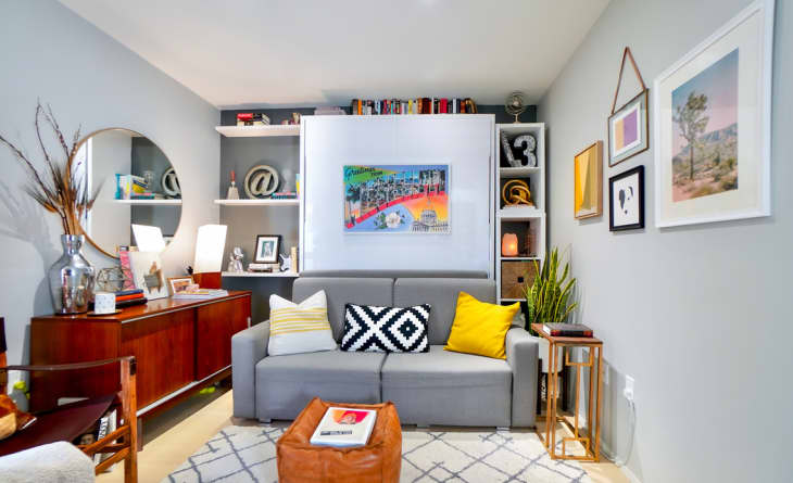 Organized living room with bright and bold accessories