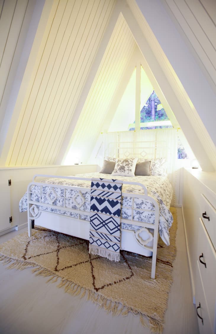 Guest bedroom in A-frame shaped house