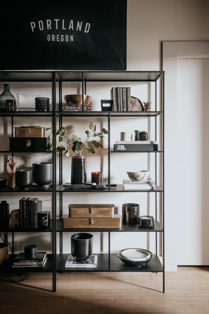 Organized and accessorized black shelf