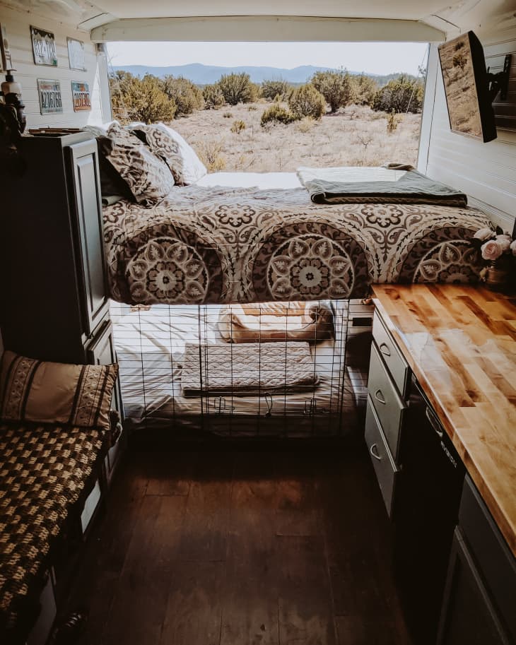 Bunked bed with boho bedding and dog bed underneath