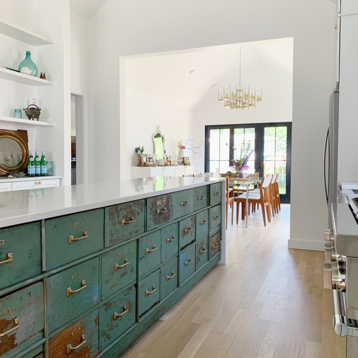 Weathered green drawers in kitchen island