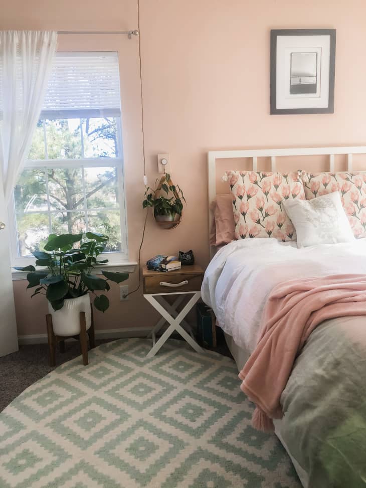 Bedroom with light pink and light seafoam color scheme