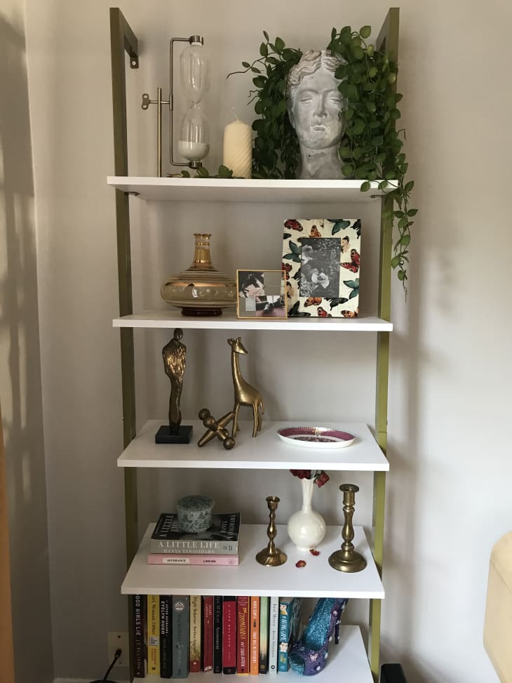 Accessorized etagere attached to wall