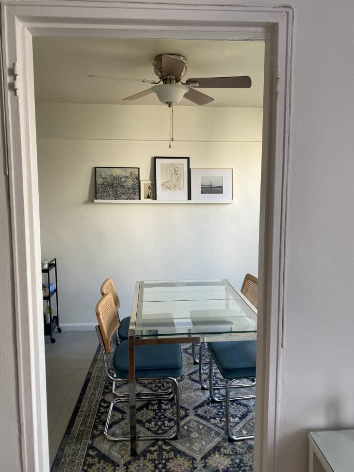 View of glass dining table through doorway