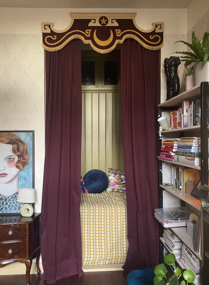 Bed in alcove with curtain