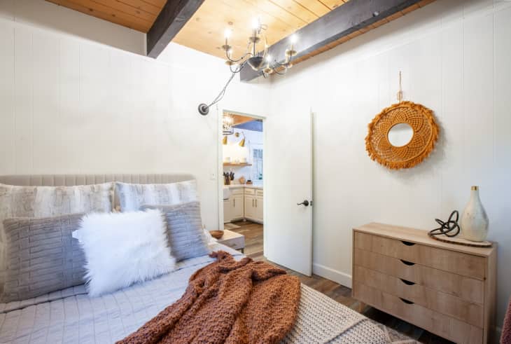 Bedroom with rust colored boho wreath
