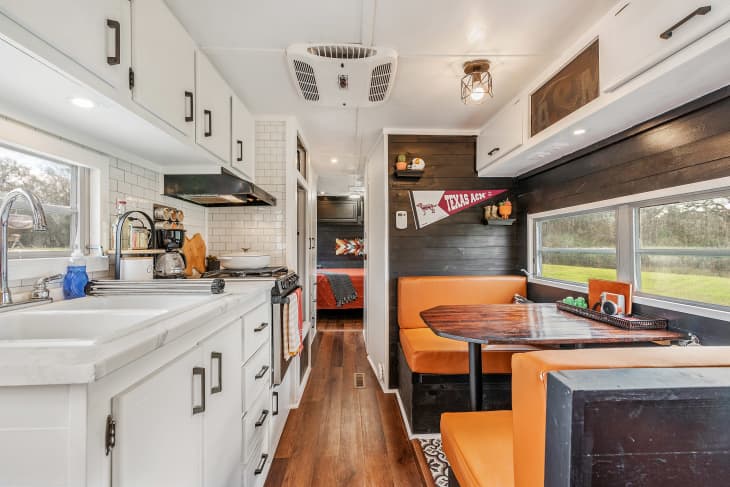 Kitchen with orange booth