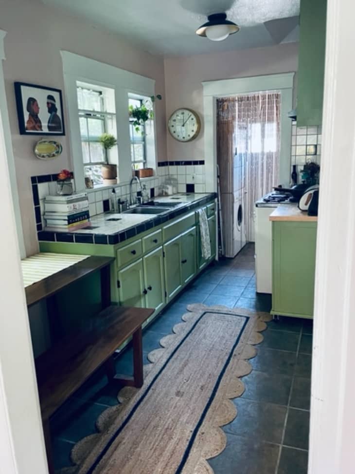 Kitchen with green cabinets