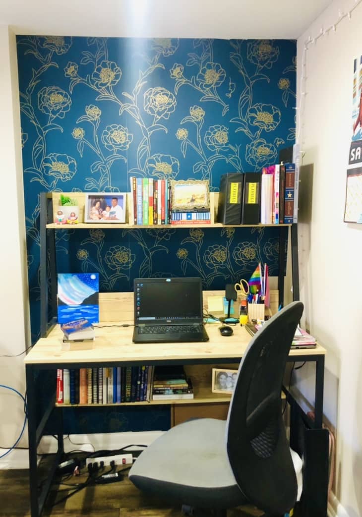 Office space with blue floral accent wall