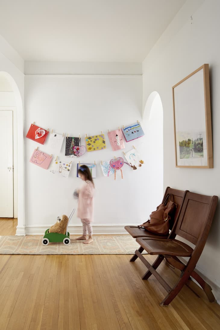 Foyer with child and hanging banners