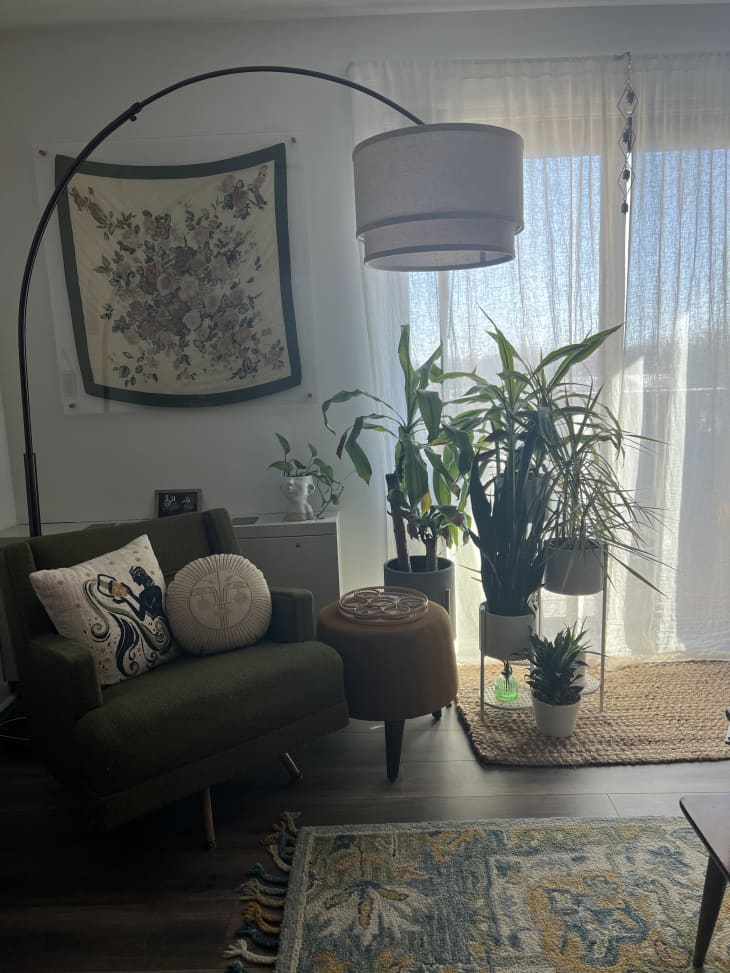 Living room corner with large lamp